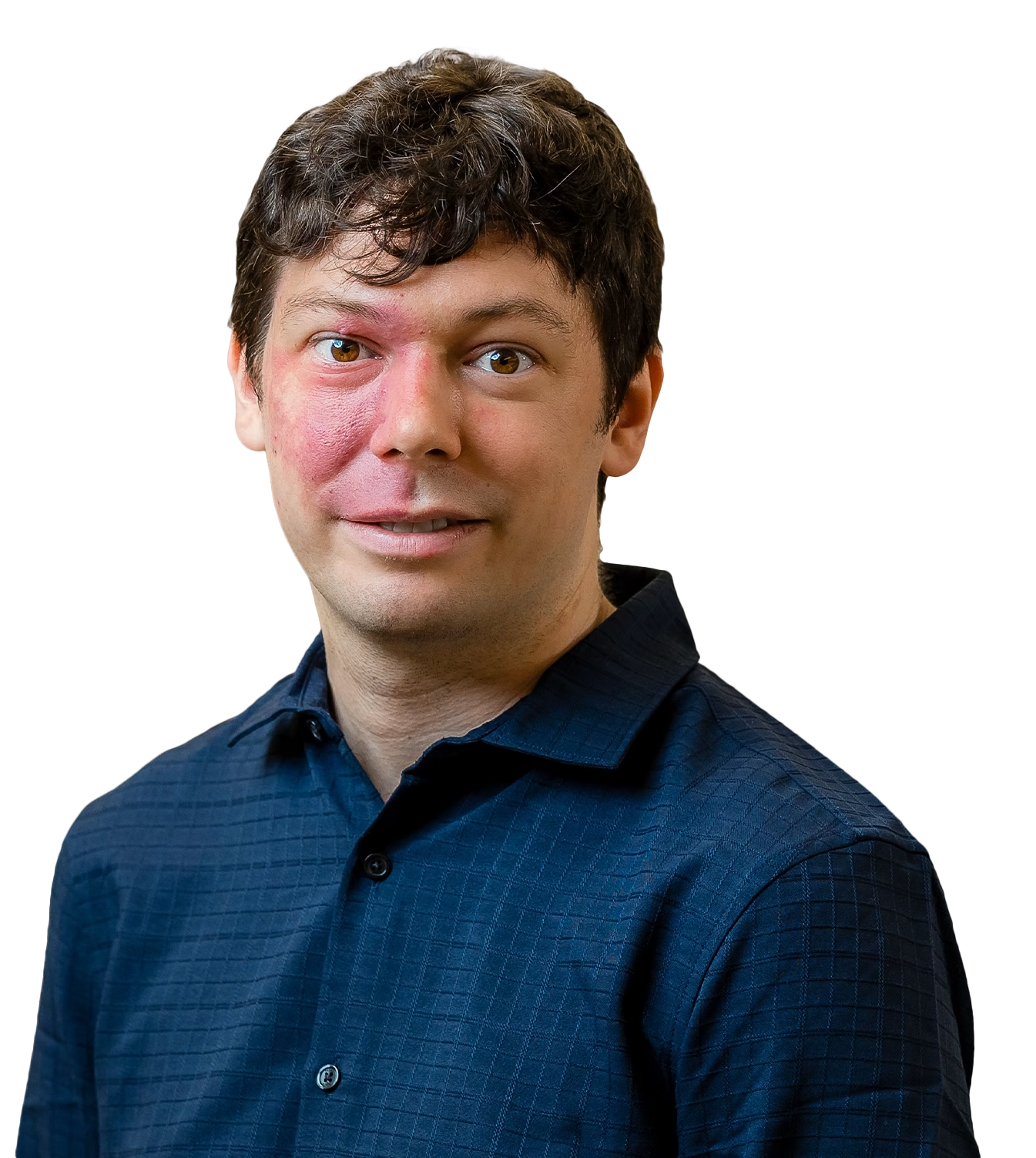 white man with short brown hair and a blue shirt