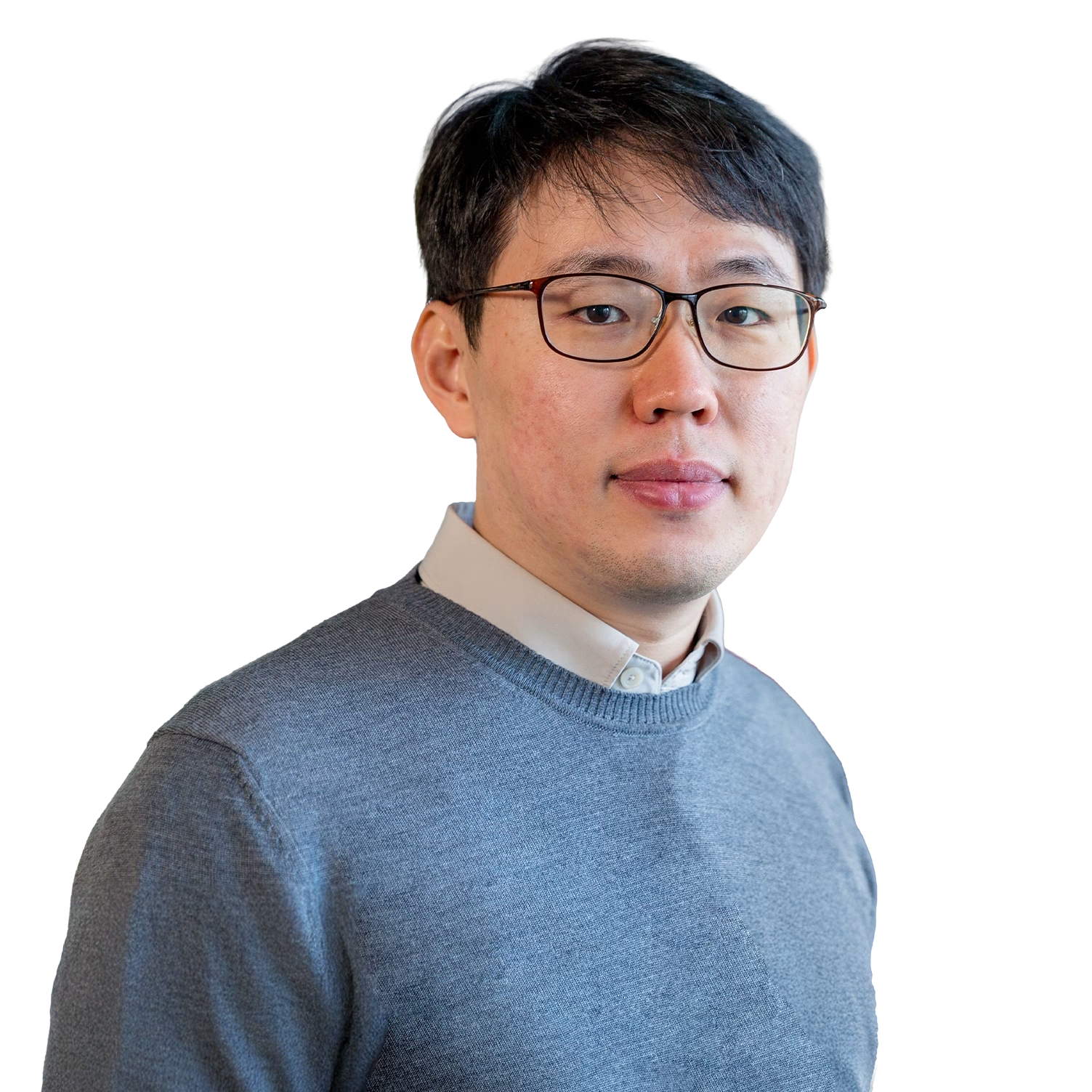 asian man with short black hair and glasses